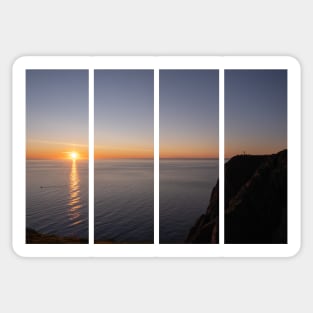 Wonderful landscapes in Norway. Nord-Norge. Beautiful scenery of a midnight sun sunset at Nordkapp (Cape North). Boat and globe on a cliff. Rippled sea and clear orange sky. Sticker